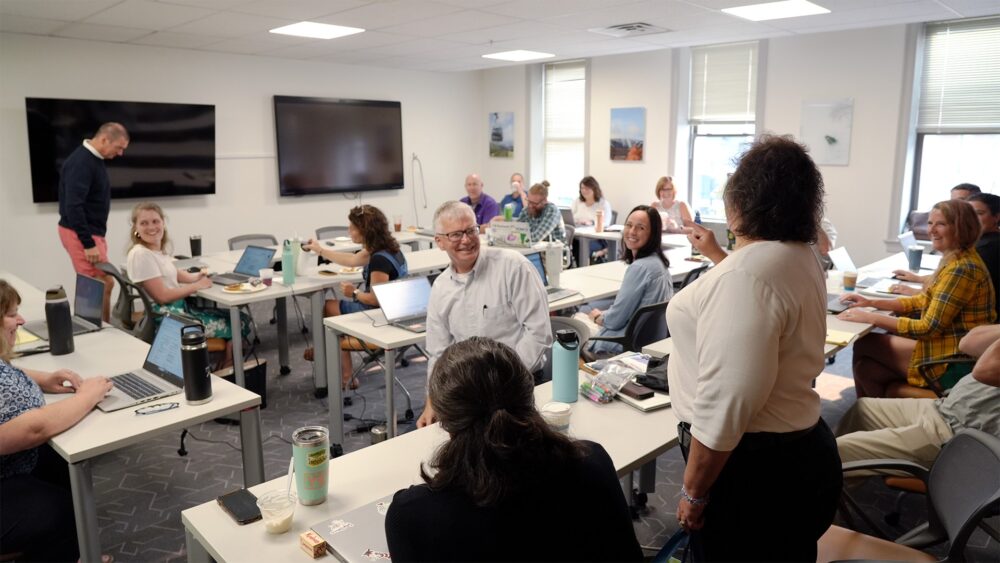 Rutland City Public Schools administrators at their summer leadership retreat in the Killington room at The Hub CoWorks in downtown Rutland, Vermont.
