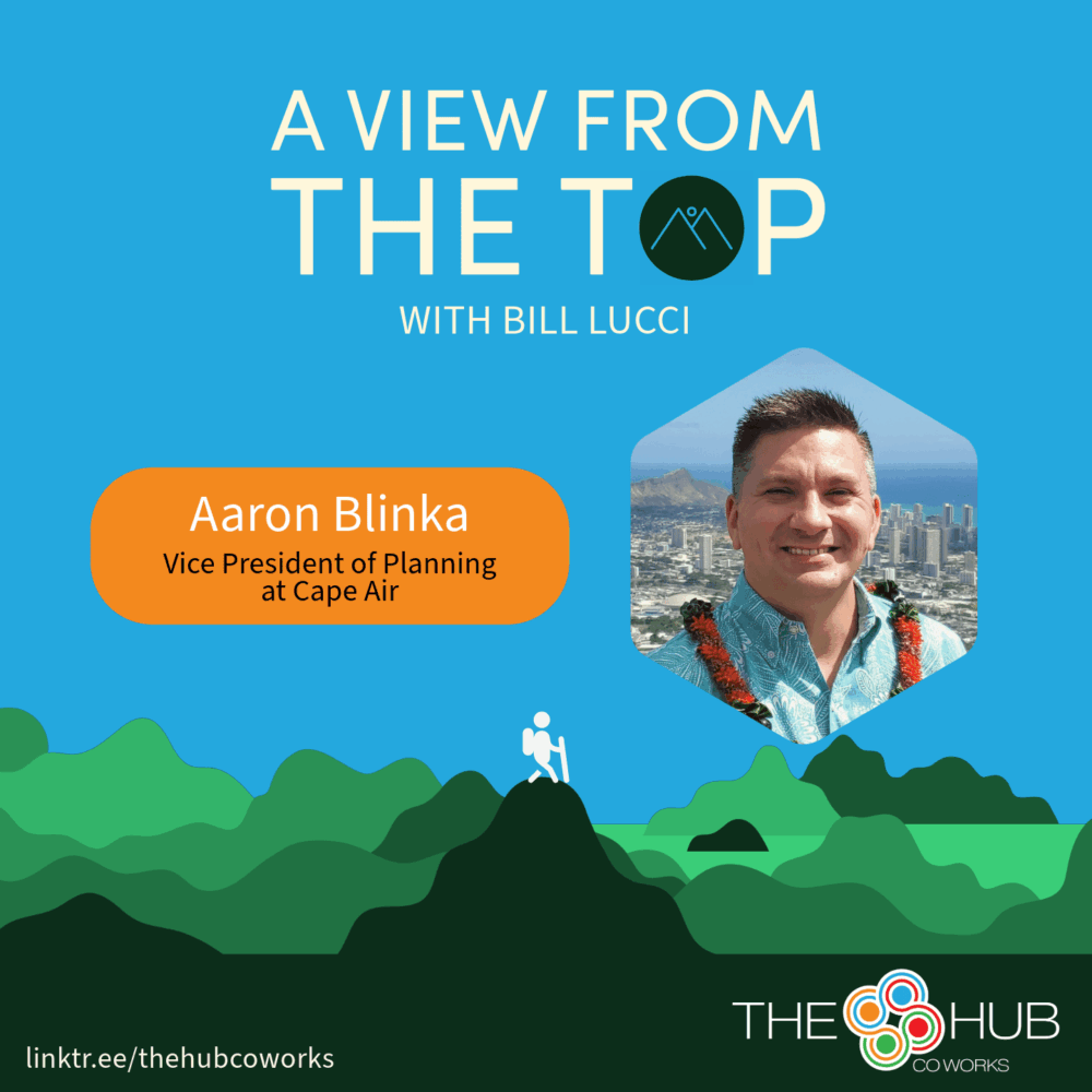 Graphic promoting the latest episode of the podcast ‘A View from the Top’ with Bill Lucci, featuring Aaron Blinka, Vice President of Planning at Cape Air. The design includes a bright blue background, a mountain illustration in green tones, and a professional headshot of Aaron Blinka wearing a Hawaiian lei with a cityscape in the background. The Hub CoWorks logo and a link to linktr.ee/thehubcoworks are displayed at the bottom.