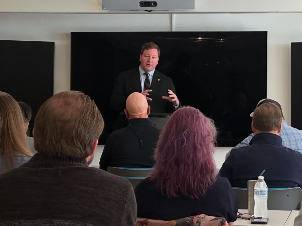 Vermont State Treasurer Mike Pieciak presents at the Hub CoWorks on August 21, 2025