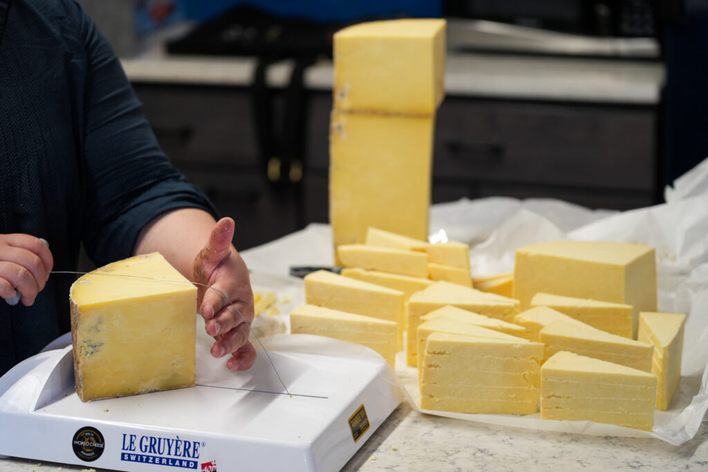 Cheese Samples Being Cut for "The Art of Tasting"